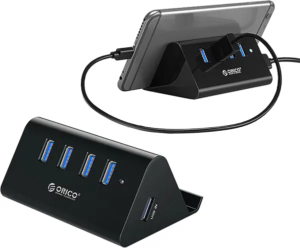 سعر ومواصفات موزع USB 3.0 من اوريكو بيانات مثلث بـ 4 منافذ وحامل موبايل لماك بوك واي ماك وماك برو - ميني واللابتوب والكمبيوتر والنوت وسيرفس وهارد HDD بكابل 1 متر (B07Z4FXKK6) على Amazon EG